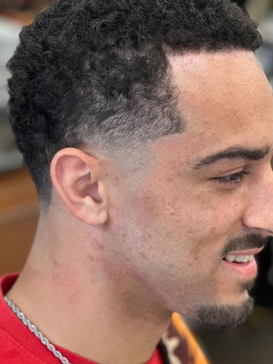 Curly top with low fade